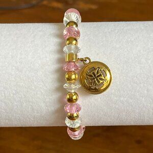Rustic Cuff Gorgeous Faceted Crystal Stainless Goldtone Logo Stretch Bracelet